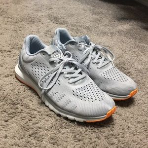 Grey and Orange Reebok trainers